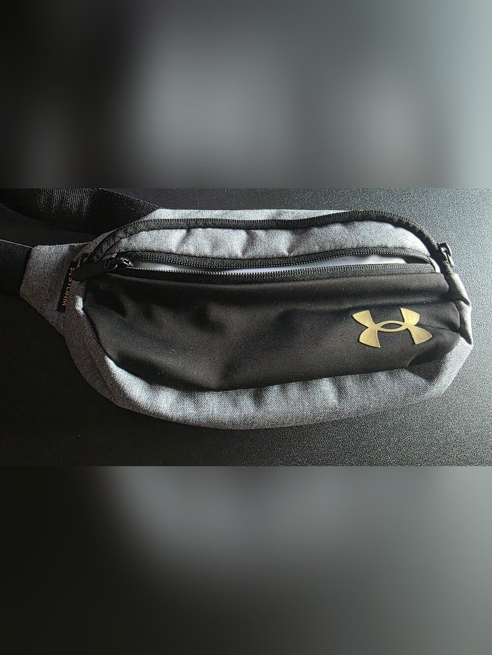 Gently used Under Armour Storm Sling Bag Crossbody Fanny Pack Gray Black Unisex